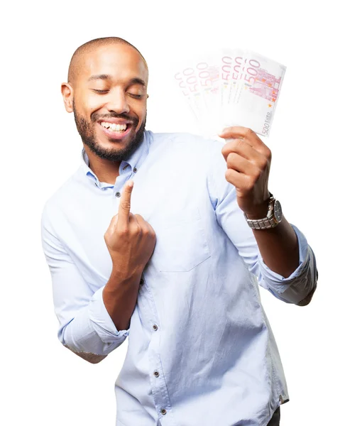 Black businessman with happy expression and money — Stock Photo, Image