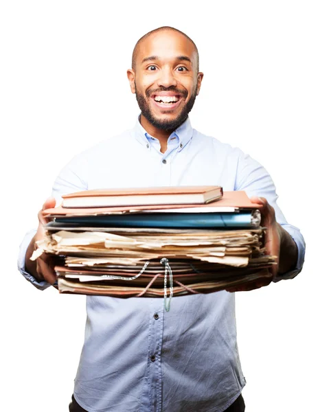 Negro joven hombre de negocios con documentos —  Fotos de Stock