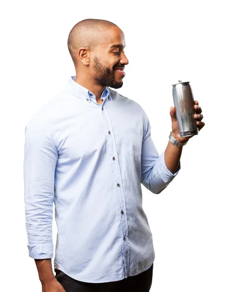 Black businessman with a bottle of beer — Stock Photo, Image