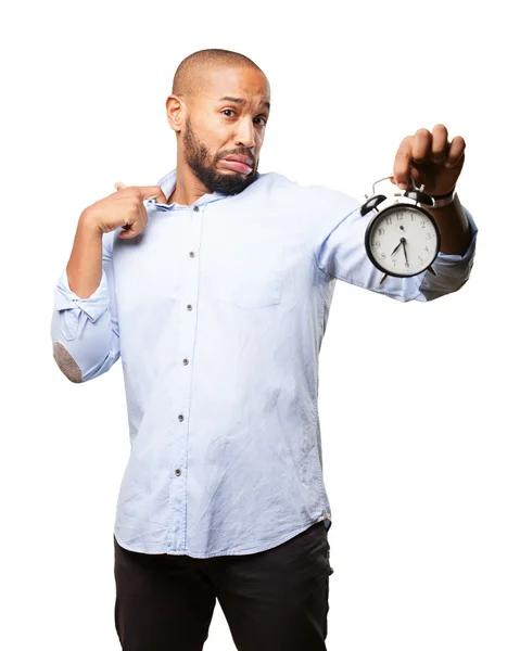 Black businessman with alarm clock — Stock Photo, Image