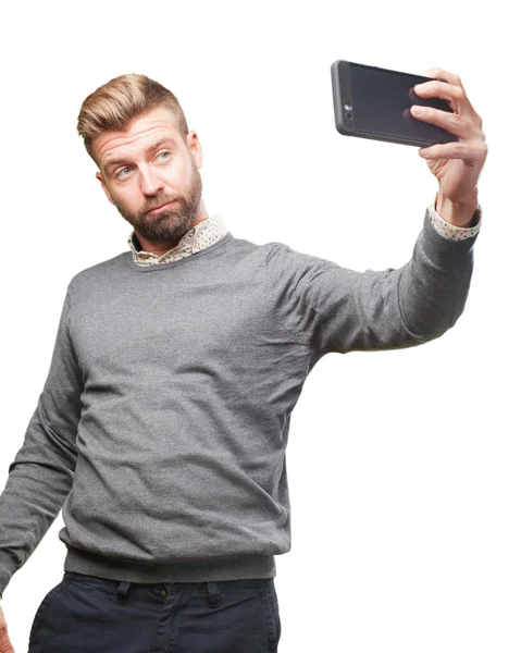 Vaalea mies matkapuhelimen kanssa — kuvapankkivalokuva