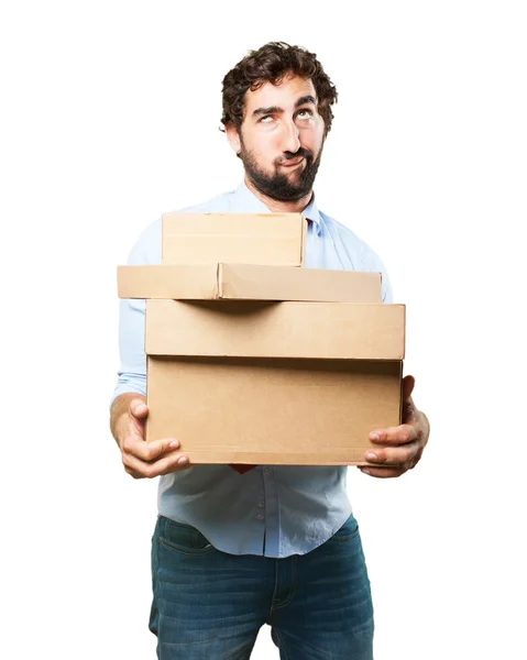 Crazy businessman with cardboard boxes — Stock Photo, Image