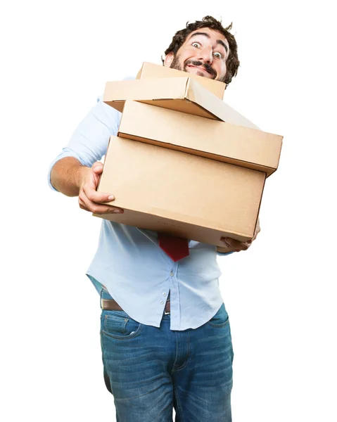 Crazy businessman with cardboard boxes — Stock Photo, Image