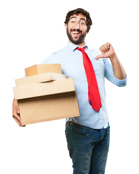 Crazy businessman with cardboard boxes — Stock Photo, Image