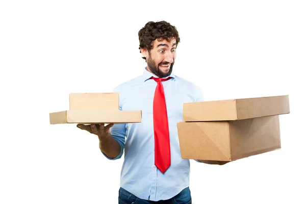 Crazy businessman with cardboard boxes — Stock Photo, Image