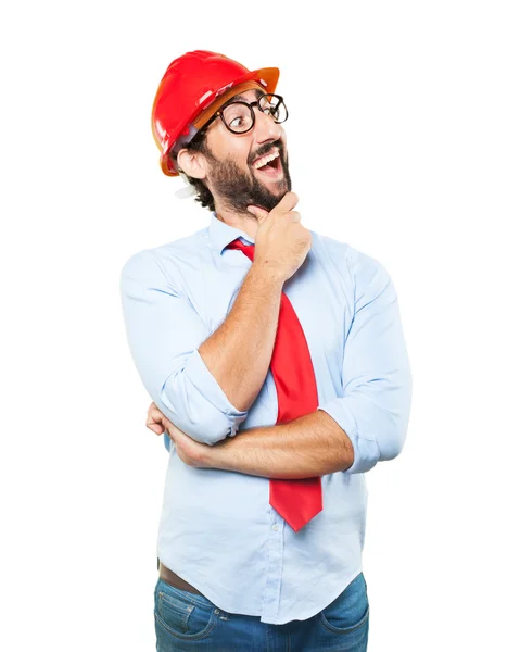 Affärsman i byggnad hatt med glad uttryck — Stockfoto