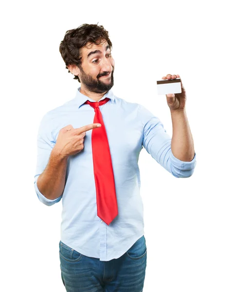 Crazy businessman with credit card — Stock Photo, Image