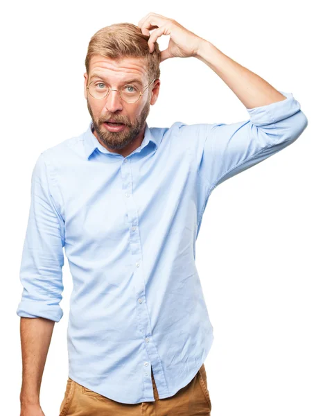 Blonder Geschäftsmann mit überraschtem Gesichtsausdruck — Stockfoto