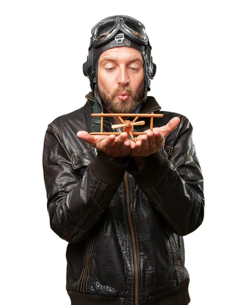 Piloto loiro com avião de brinquedo — Fotografia de Stock