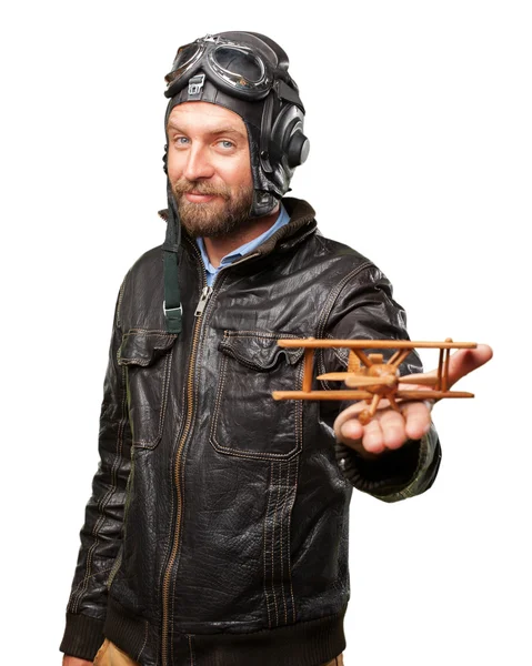 Blond pilot with toy plane — Stock Photo, Image
