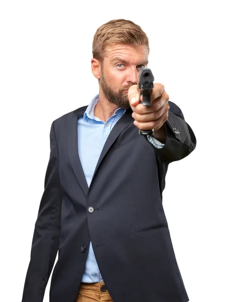 Crazy businessman with pistol — Stock Photo, Image