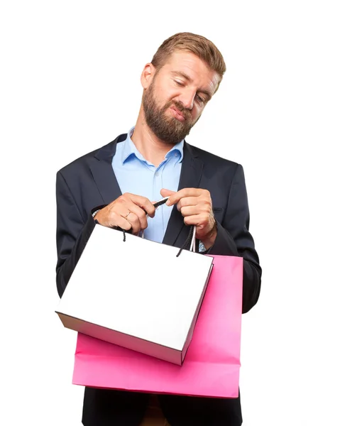 Hombre de negocios rubio con bolsas de compras —  Fotos de Stock