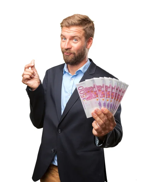 Блондин счастливый бизнесмен с банкнотами — стоковое фото