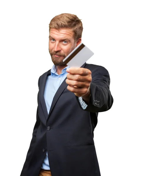 Blond zakenman met credit card — Stockfoto