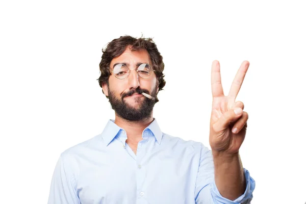 Louco homem fuma cigarro com expressão — Fotografia de Stock