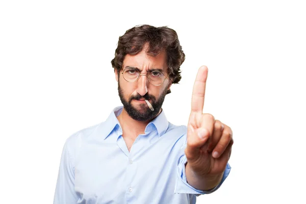 Crazy man smokes cigarette with expression — Stock Photo, Image