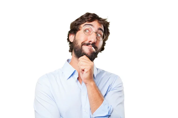 Crazy man smokes cigarette with expression — Stock Photo, Image