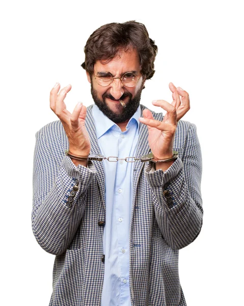 Crazy hippie man with handcuffs — Stock Photo, Image