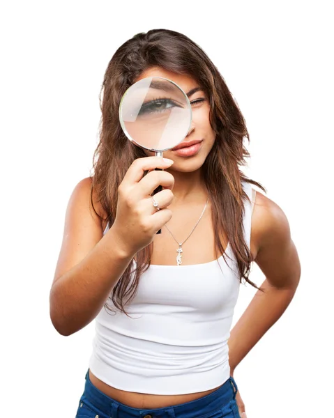 Young black girl with magnifying glass — Stock Photo, Image