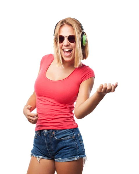 Luisteren muziek meisje met koptelefoon — Stockfoto