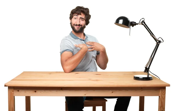 Crazy man at table with happy expression — Stock Photo, Image