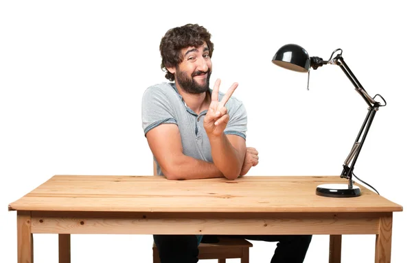 Crazy man at table with happy expression — Stock Photo, Image