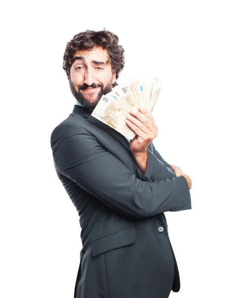 Crazy businessman with lot of money — Stock Photo, Image