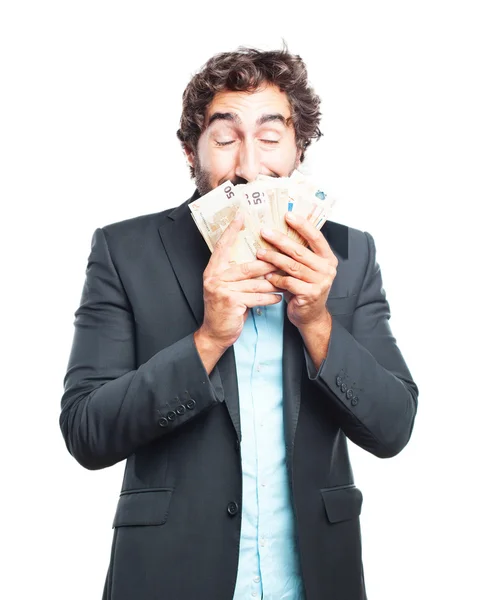 Crazy businessman with lot of money — Stock Photo, Image