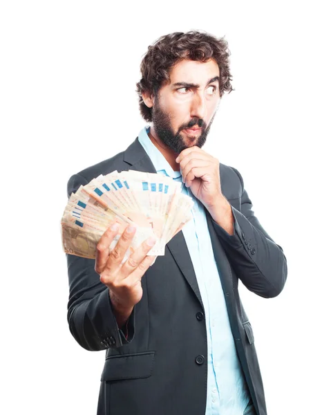 Crazy expression businessman with banknotes — Stock Photo, Image