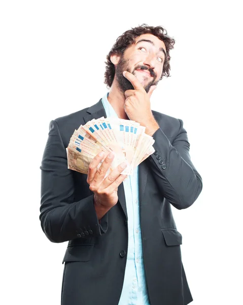 Crazy uttryck affärsman med sedlar — Stockfoto