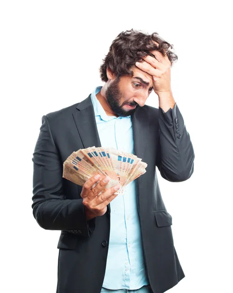 Crazy expression businessman with banknotes — Stock Photo, Image