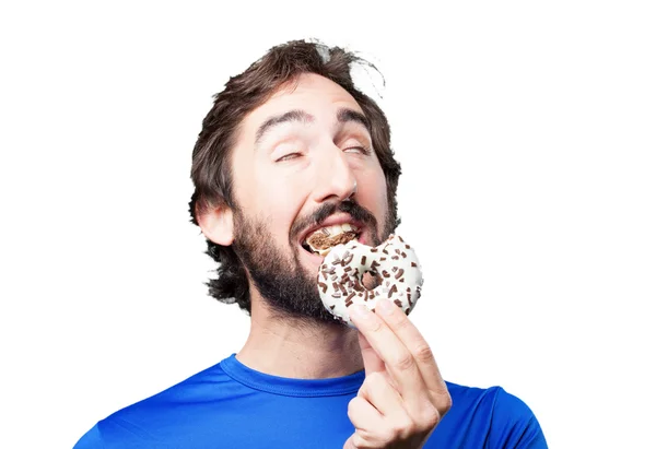 Louco homem de esportes com donut — Fotografia de Stock