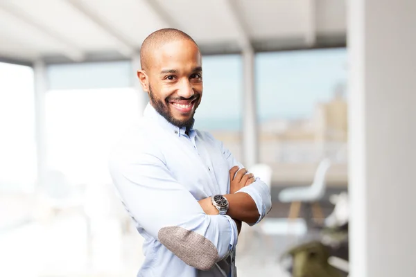 Hombre de negocios negro con expresión feliz — Foto de Stock