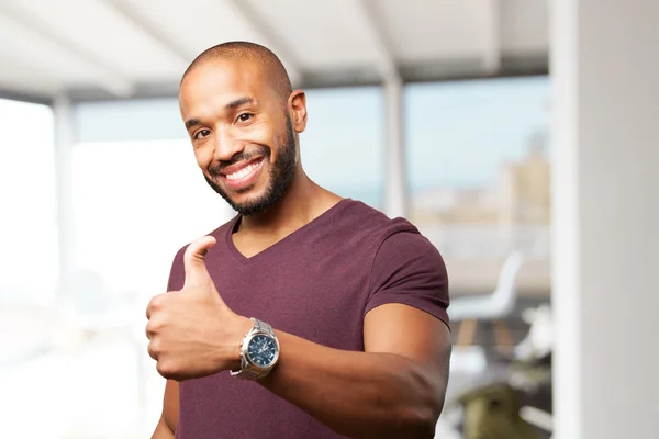 Hombre de negocios negro con expresión feliz — Foto de Stock