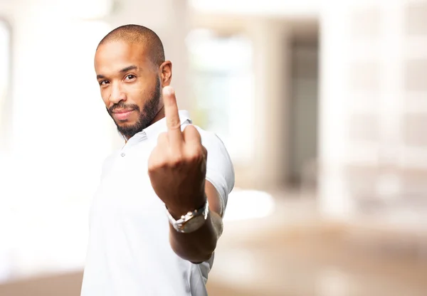 Homem negro com expressão irritada — Fotografia de Stock