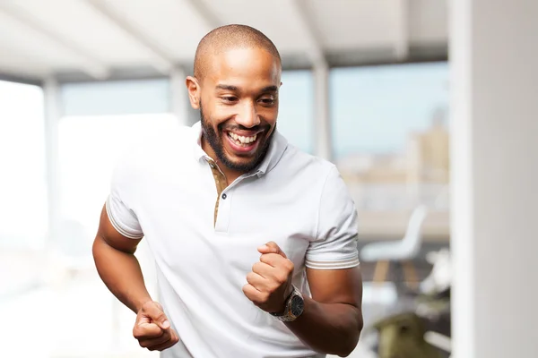 Hombre de negocios negro con expresión feliz — Foto de Stock