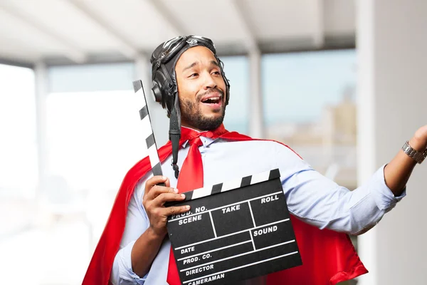 Homme d'affaires noir avec clapperboard — Photo