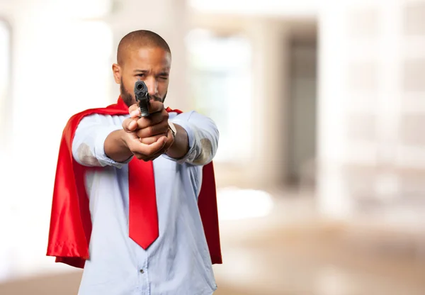 Negro joven con pistola —  Fotos de Stock