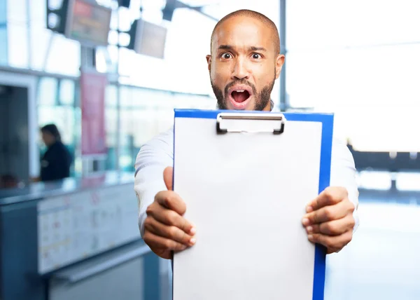 Black man with empty folder — Stock Photo, Image