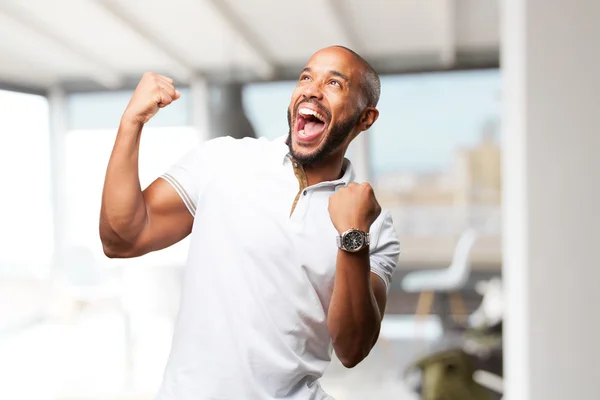 Hombre de negocios negro con expresión feliz — Foto de Stock