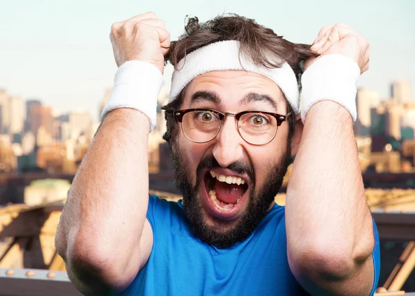 Crazy sports man with funny expression — Stock Photo, Image