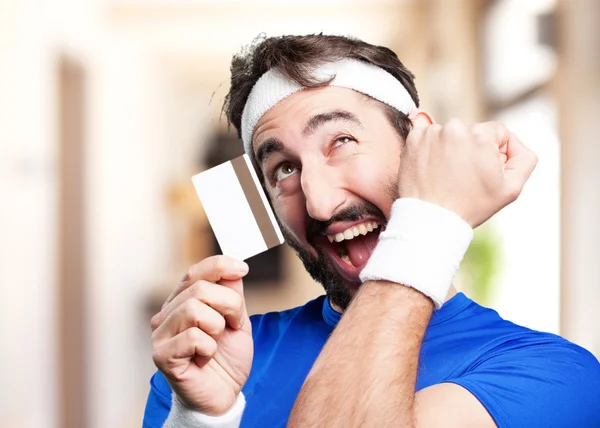 Fou sportif homme avec carte de crédit — Photo