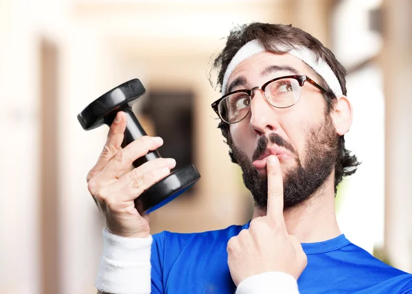 Crazy sports man with dumbbell — Stock Photo, Image