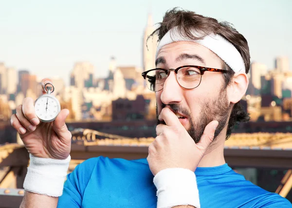 Crazy sports man with stopwatch — Stock Photo, Image