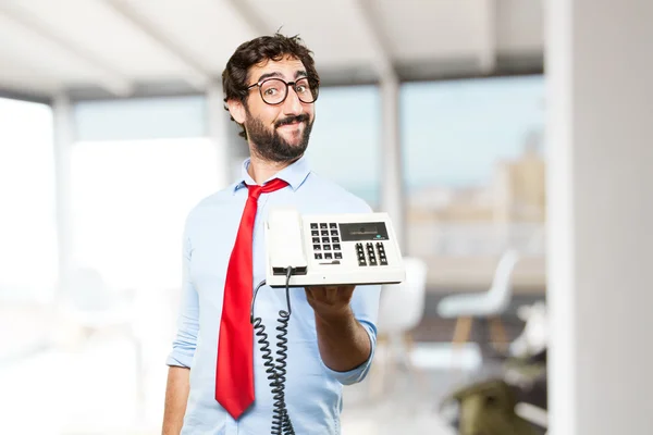 Homme d'affaires fou avec vieux téléphone — Photo