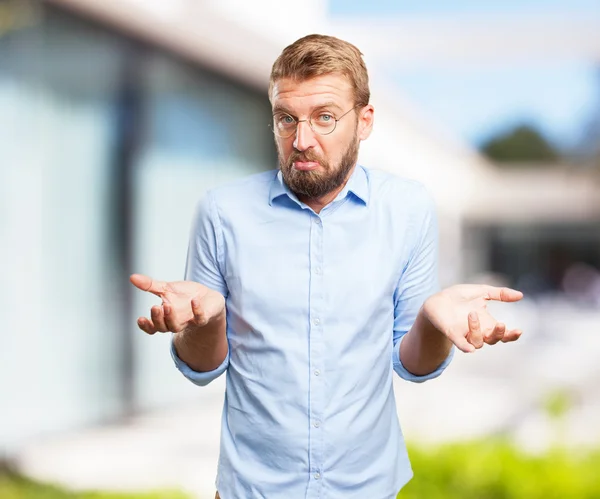 Crazy businessman with worried expression — Stock Photo, Image