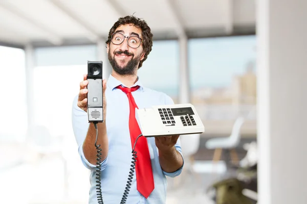 Crazy businessman with old telephone — Stock Photo, Image