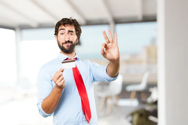 Gek zakenman met credit card — Stockfoto