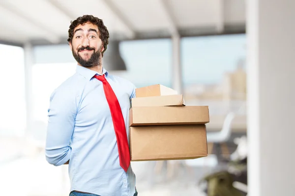 Crazy man with with cardboard boxes — Stock Photo, Image
