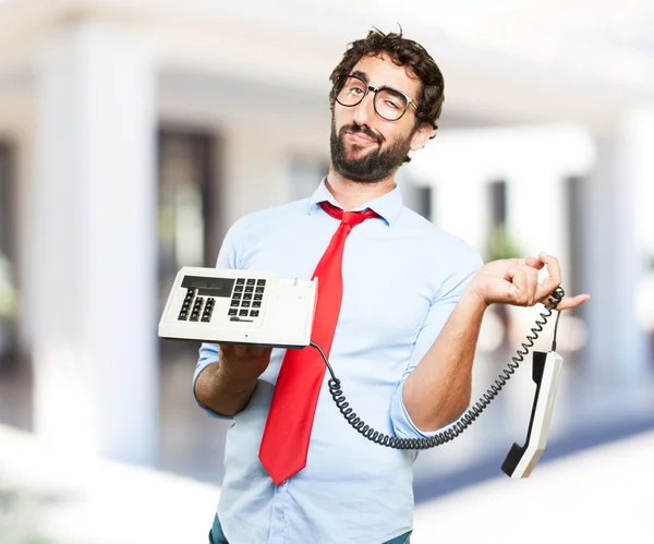 Homme d'affaires fou avec vieux téléphone — Photo